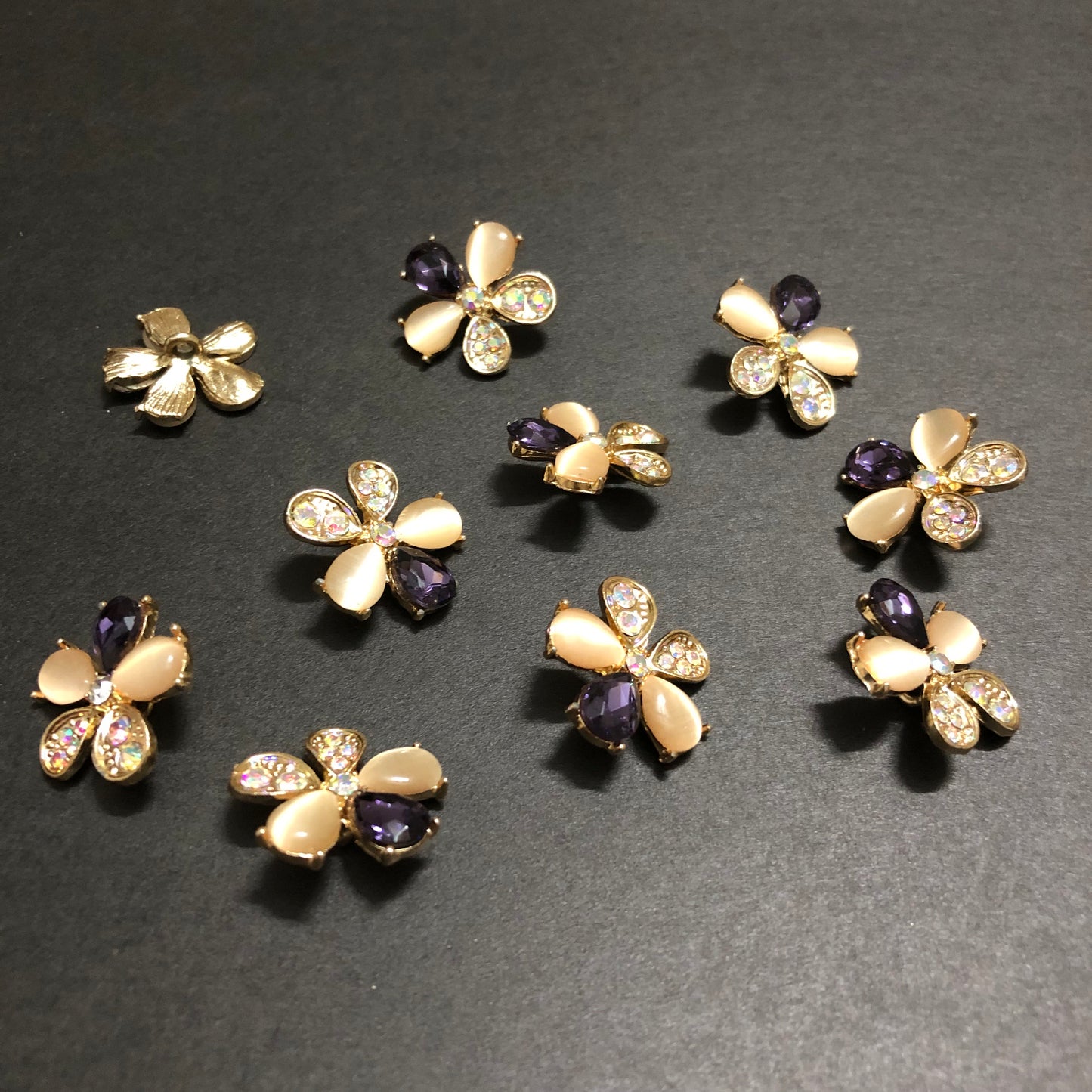 Petal Whirls Multi-Colour Crystals with Beige Marbles and Purple Stone Golden Buttons