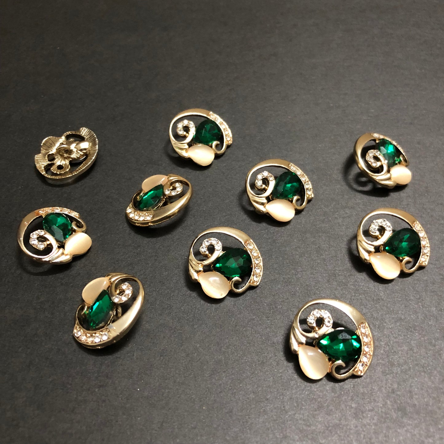 Cyclone Charms Silver Crystals with Beige Marbles and Emerald Green Stone Golden Buttons
