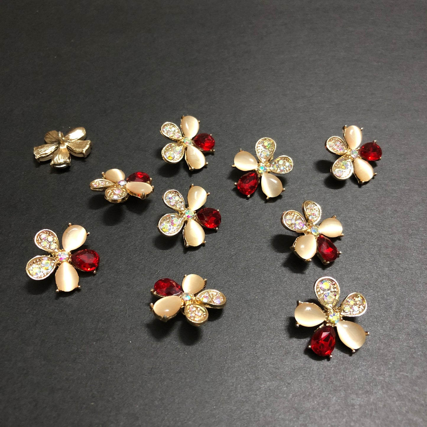 Petal Whirls Multi-Colour Crystals with Beige Marbles and Red Stone Golden Buttons