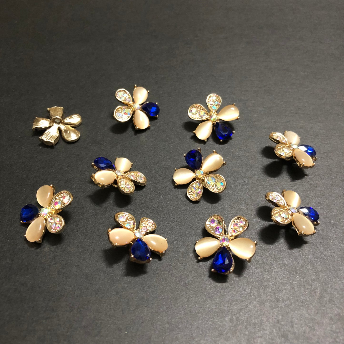 Petal Whirls Multi-Colour Crystals with Beige Marbles and Blue Stone Golden Buttons