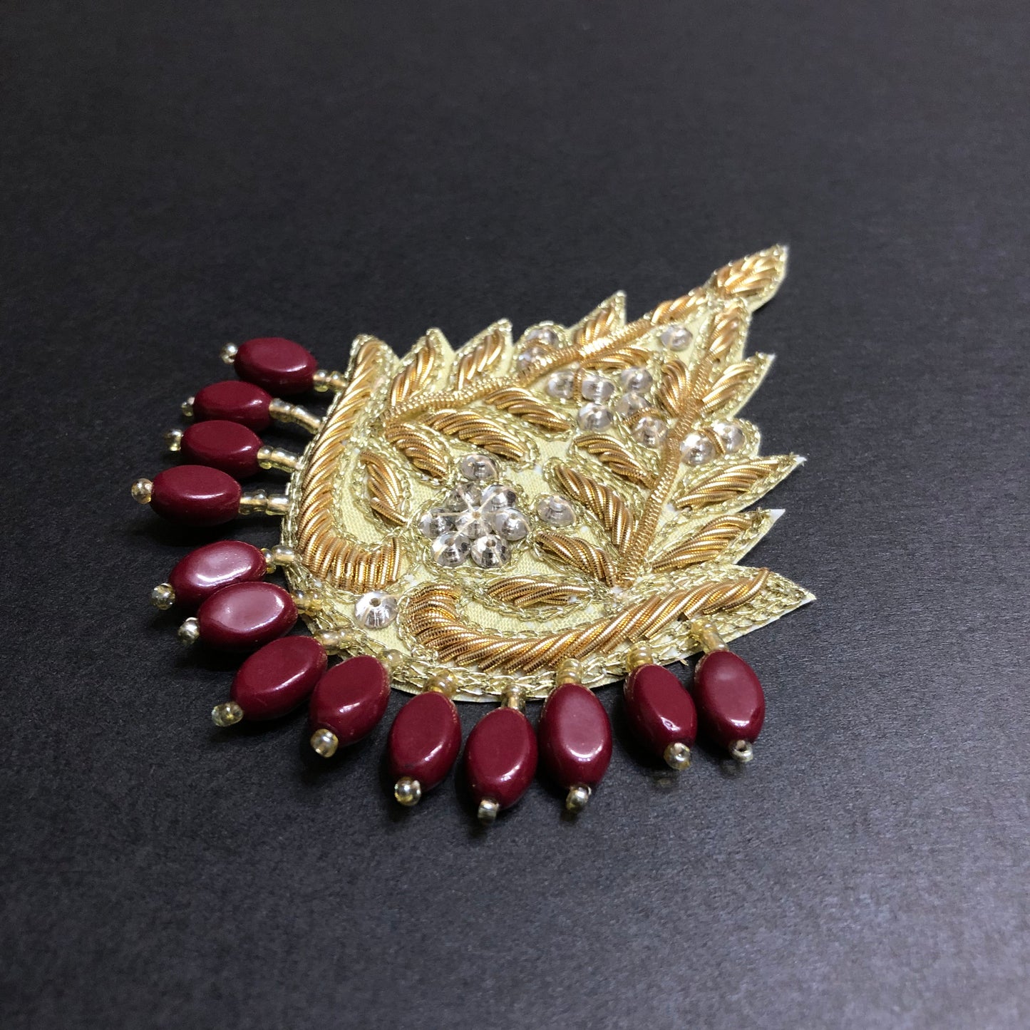 Mini Alluring Maroon Beads Golden Motif