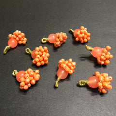 Dangling Orange Opaque Crystals Golden Tassel