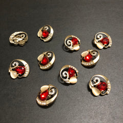 Cyclone Charms Silver Crystals with Beige Marble and Red Stone Golden Buttons