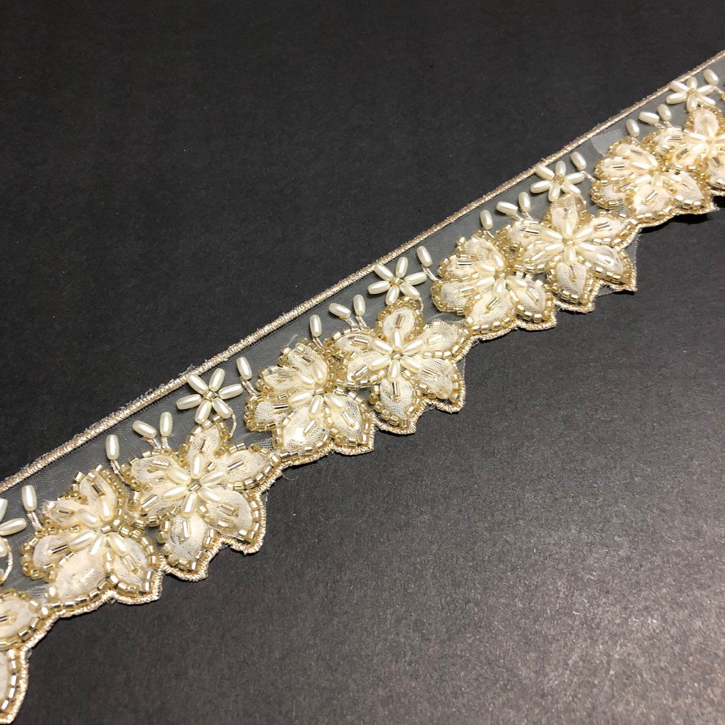 Cut-Edge Bloomy Golden Cutdana, White Beads, and Off-White Net Tissue Lace