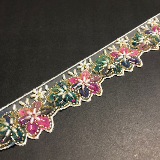 Cut-Edge Bloomy Golden Cutdana, Off-White Beads, and Bottle Green, Purple, Shades of Pink and Mauve Net Tissue Lace