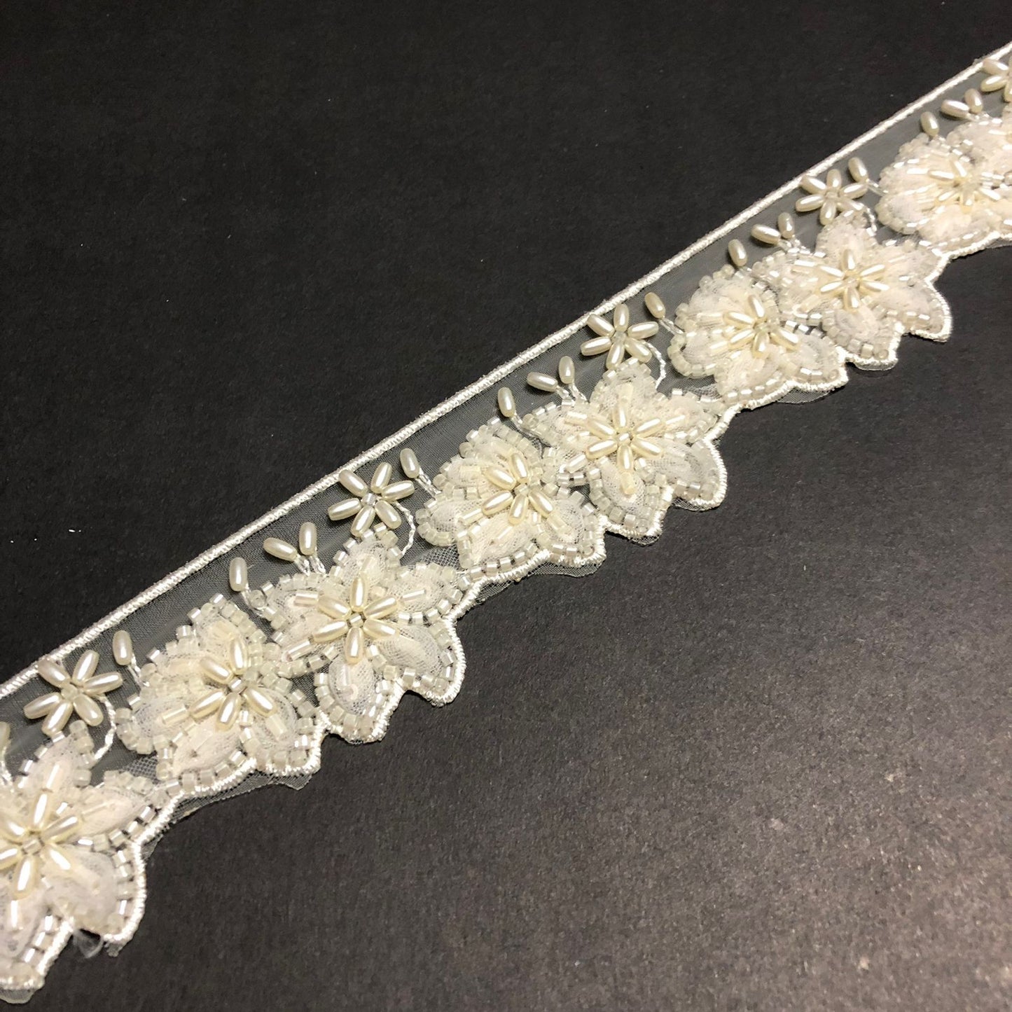 Cut-Edge Bloomy Off-white Cutdana, Off-white Beads, and Off-white Net Tissue Lace